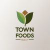 Town Food's logo - Similar company to Adam'S Harvest