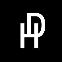 Dom Hombre logo - Similar company to Guestandsuites.Com