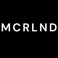 MCRLND logo - Similar company to Genius Steals