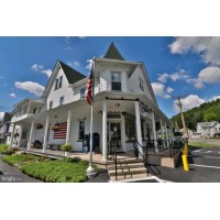Lizard Creek Inn logo - Similar company to Global Wellbeing Group