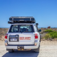 Red Dirt 4WD Rentals logo - Similar company to Rv Solar Solutions