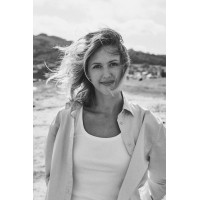 Tatyana Kizeeva Photography logo - Similar company to Millennium Images