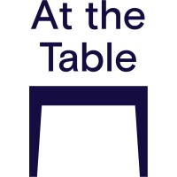 At the Table logo - Similar company to Beyond-Development.Org