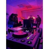The DJ Workshop logo - Similar company to International Robotics And Ai Agency (Iraia)
