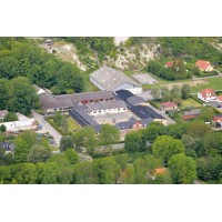 Gudumholm Skole logo - Similar company to Politologisk Forening