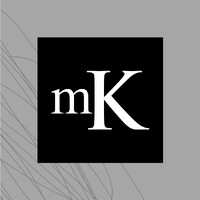 MK logo - Similar company to Guesher