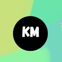 KM logo - Similar company to Escors