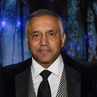 Paul Bassi CBE logo - Similar company to Bond Wolfe