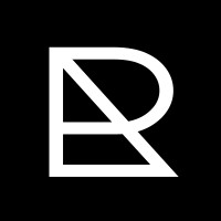 Reactor.is logo - Similar company to The Barnhart Company