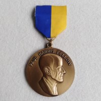 Rotary Paul Harris Fellow logo - Similar company to Rotary Distrikt 1830