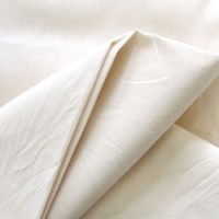 Cotton Grey Fabric logo - Similar company to Cotton Patch Embroidery
