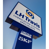 LH Travis logo - Similar company to Flo Components Ltd. - Automatic Lubrication & Vehicle Fire Suppression Systems