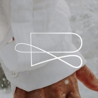 Roni Lacerda logo - Similar company to The Sanctuary