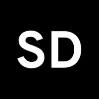 Shumon Digital logo - Similar company to Macro Media Source