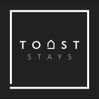 Toast Stays logo - Similar company to Toast Estates