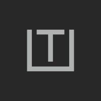 Trait Marketing logo - Similar company to Freshly Pressed