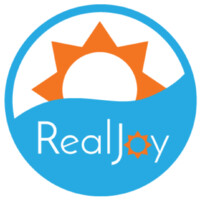 RealJoy Vacations logo - Similar company to Peru Mission