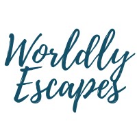 Worldly Escapes logo - Similar company to Call Me Guide