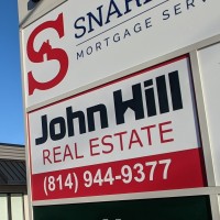 John Hill Real Estate logo - Similar company to Schultz Real Estate Group