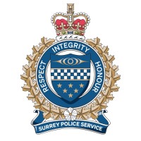 Surrey Police Service logo - Similar company to E-Comm 9-1-1 | Emergency Communications For British Columbia Incorporated