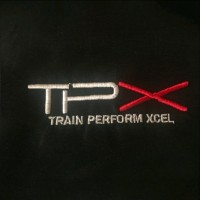 T.P.X. logo - Similar company to Actionable Innovation