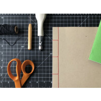 Papercut Zine Library logo - Similar company to Boston Library Consortium