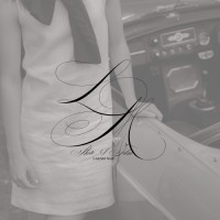 LarnieMae Photography logo - Similar company to Shutter & Snap Photography
