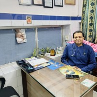 Dr Karan Chopra logo - Similar company to Avana Plastic Surgery