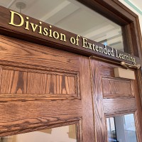 SUNY Oswego Division of Extended Learning logo - Similar company to Auxiliary Services