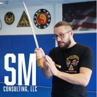 Sifu Mitchell Consulting logo - Similar company to Hatchers Martial Arts