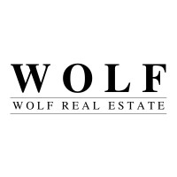 Wolf Real Estate logo - Similar company to Mesa Cares