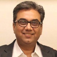 Manuj Bajaj logo - Similar company to GreyBox Technologies
