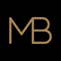 Michael Bennett Homes logo - Similar company to Airoom Architects, Builders, And Remodelers