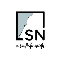 South to North logo - Similar company to Studio Luck