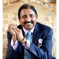 Vinney (Smile) Chopra logo - Similar company to Anmol Empire™️ (Venture Of Rajesh Chopra Estates Private Limited)