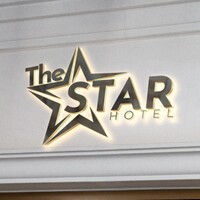 The Win Star logo - Similar company to Legendary Chocolatier
