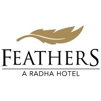 Feathers - A Radha Hotel logo - Similar company to Aamby Valley City, Sahara India Flagship Project