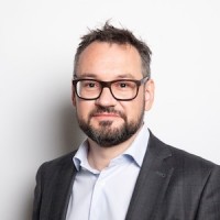 The Sniukas Company logo - Similar company to Social Impact Photography