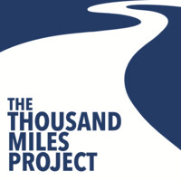 The Thousand Miles Project logo - Similar company to 1Community