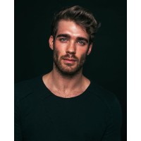 Zac Efron logo - Similar company to Bottom Line Mngmt