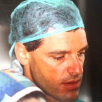 Short Implant and Oral and Maxillofacial Surgery logo - Similar company to Omfs-Impath Research Group