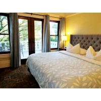 Division Inns, the Evermore & Bluebird Guesthouses logo - Similar company to Garnish Apparel