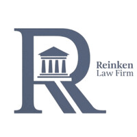 The Reinken Law Firm logo - Similar company to Southeast Louisiana Legal Services