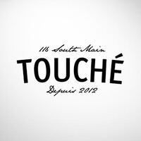 Touché logo - Similar company to Over The Moon