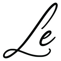 Lynn Everhart logo - Similar company to Whelmed Podcast