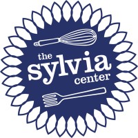 The Sylvia Center logo - Similar company to Kazoo Snacks