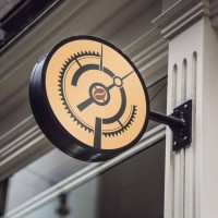 Clockwork Coworking Café logo - Similar company to Purée!