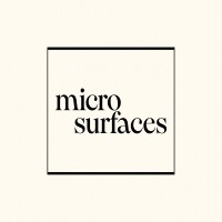 Microsurfaces logo - Similar company to Atom