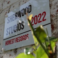 Sherwood Studios logo - Similar company to Power Of One Fitness