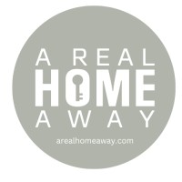 A Real Home Away logo - Similar company to Genova Construction & Development
